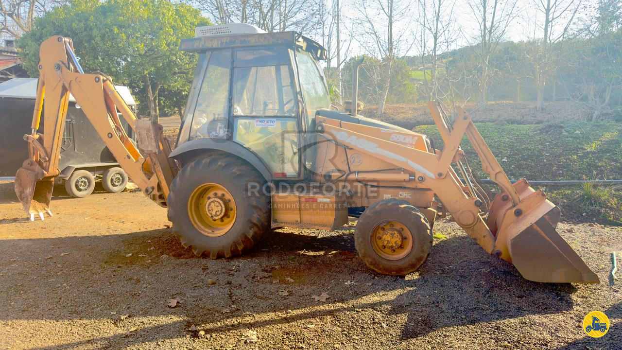 RETRO ESCAVADEIRA CASE 580M Tração 4x4 Rodoforte Caminhões CRISSIUMAL RIO GRANDE DO SUL RS